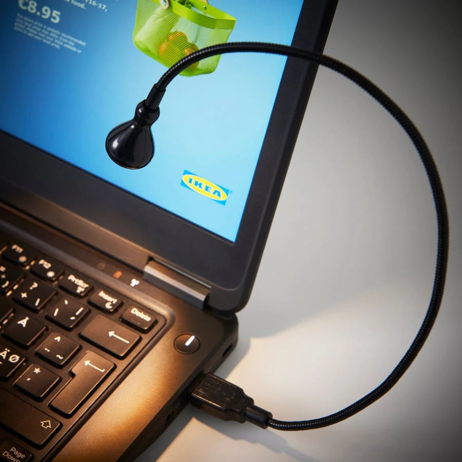 IKEA JANSJÖ LED desk lamp on workspace