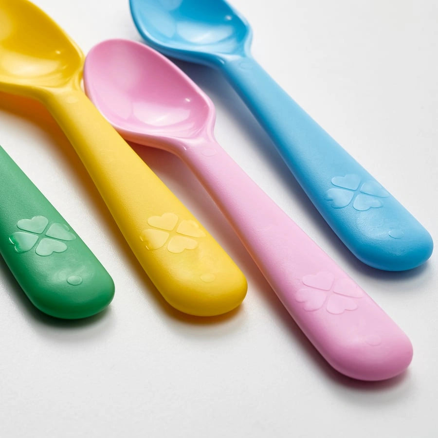 Close-up of IKEA KALAS reusable plastic spoons
