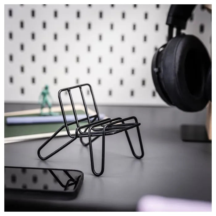 IKEA KRUBBET phone holder in Pakistani workspace.