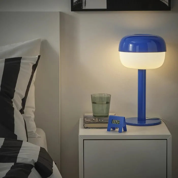 IKEA KUPONG alarm clock placed on bedside table