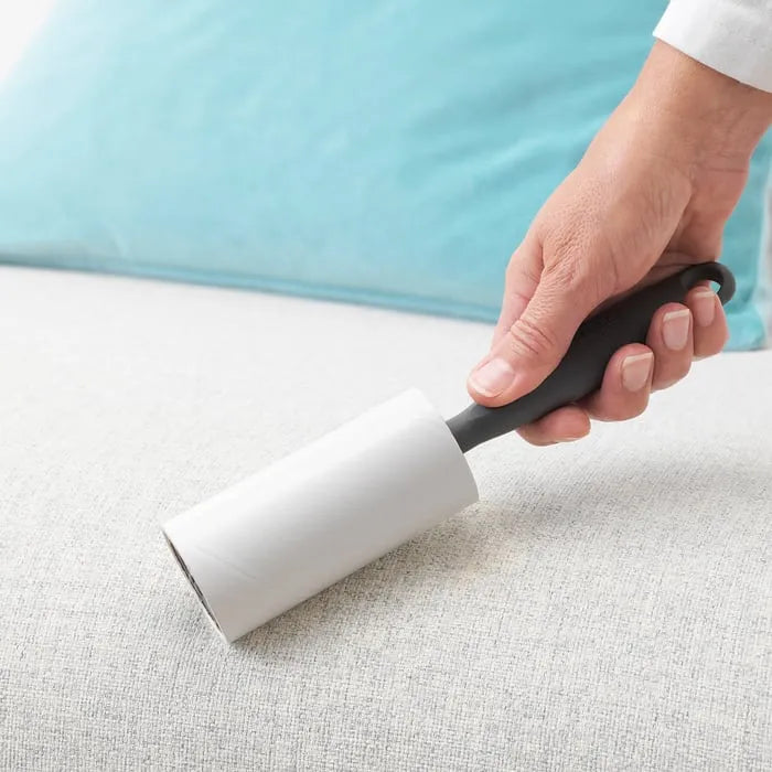 IKEA BÄSTIS lint roller cleaning pet hair from sofa