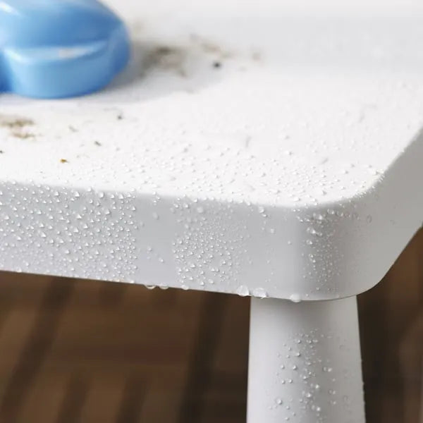 Lightweight IKEA MAMMUT kids table easy to clean white.