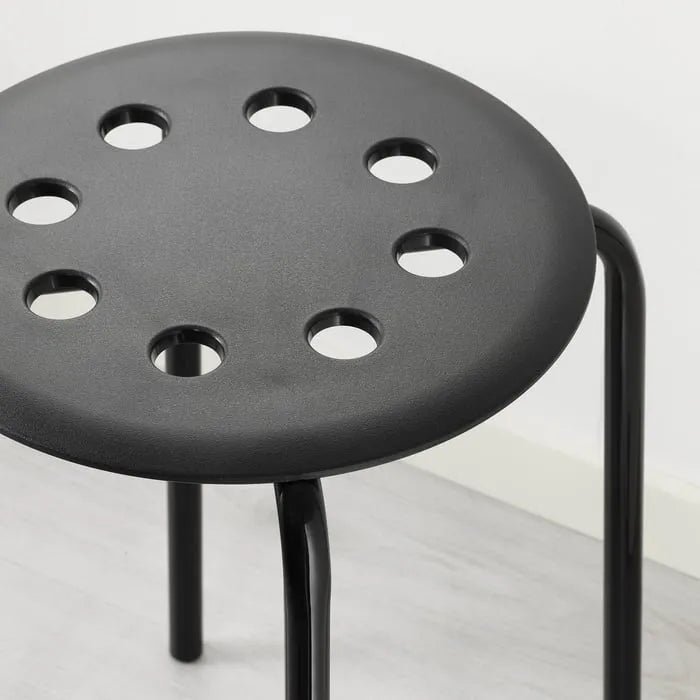 Closeup of IKEA MARIUS stool black 45 cm.