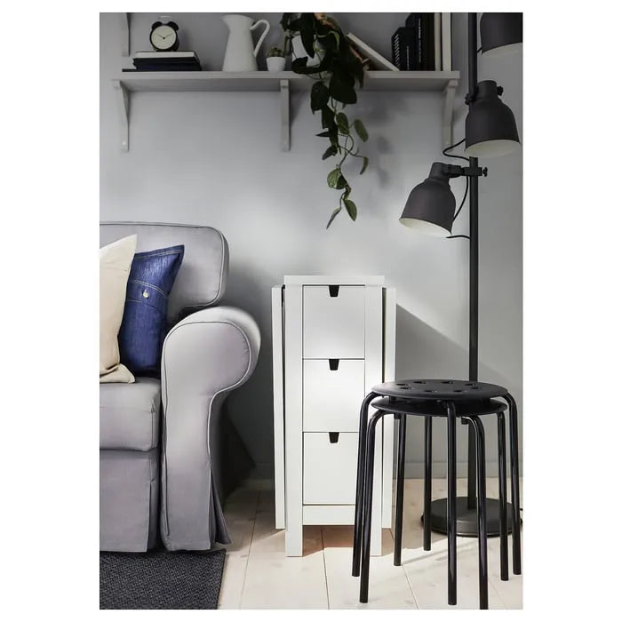 Stackable IKEA MARIUS stools in black.