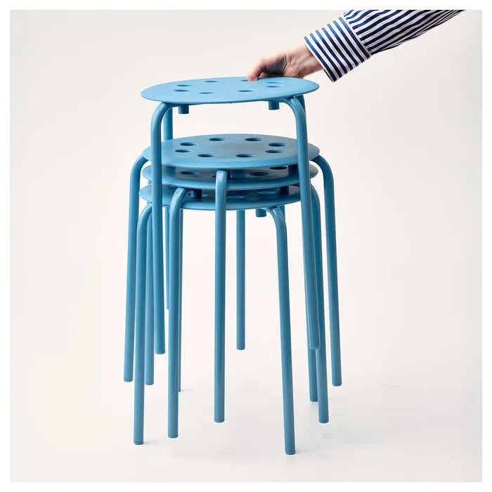 Stackable IKEA MARIUS stools in blue.