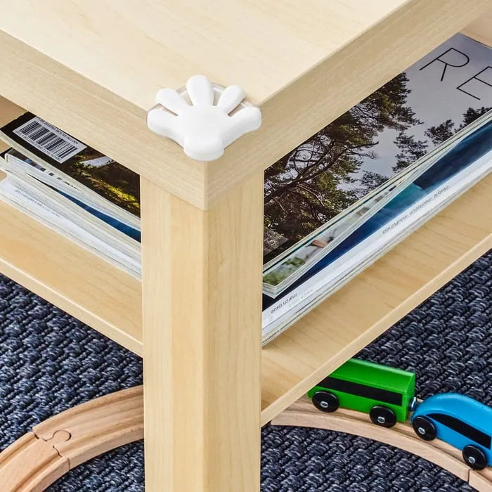 White child safety corner protectors for furniture edges.