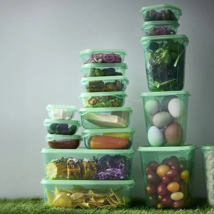 IKEA green food storage containers in multiple sizes.