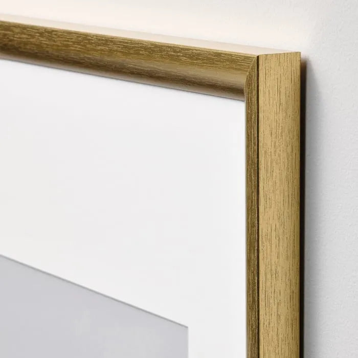 Side view of IKEA SILVERHOJDEN gold photo frame.