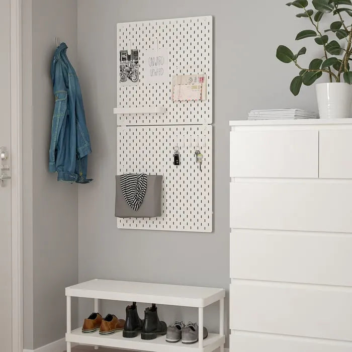 IKEA SKÅDIS white connector for pegboards.