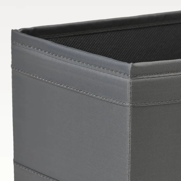 Dark grey IKEA SKUBB organizer boxes for closet and clothes storage.