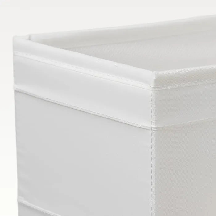 White IKEA SKUBB organizer boxes for closet and clothes storage.