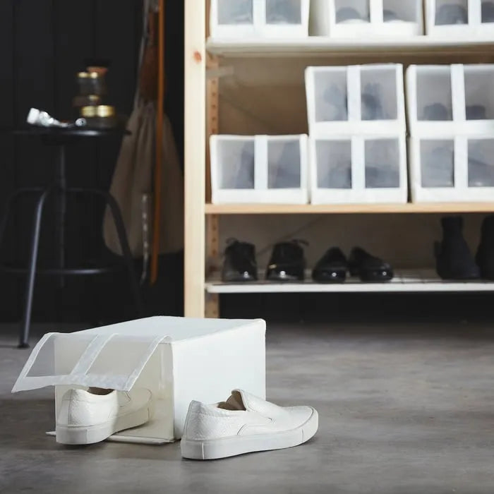 Stackable IKEA SKUBB white shoe storage box for closet.