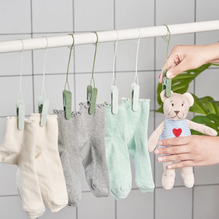 IKEA SLIBB green clothes pegs