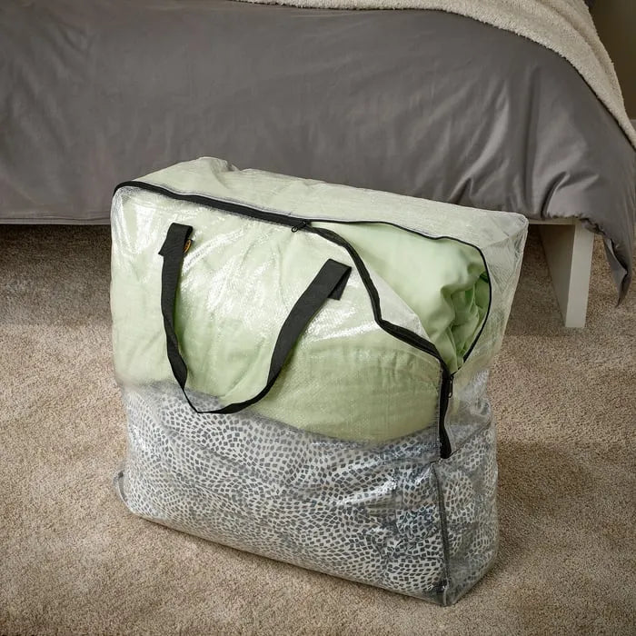 Clothes neatly stored inside IKEA DIMPA storage bag