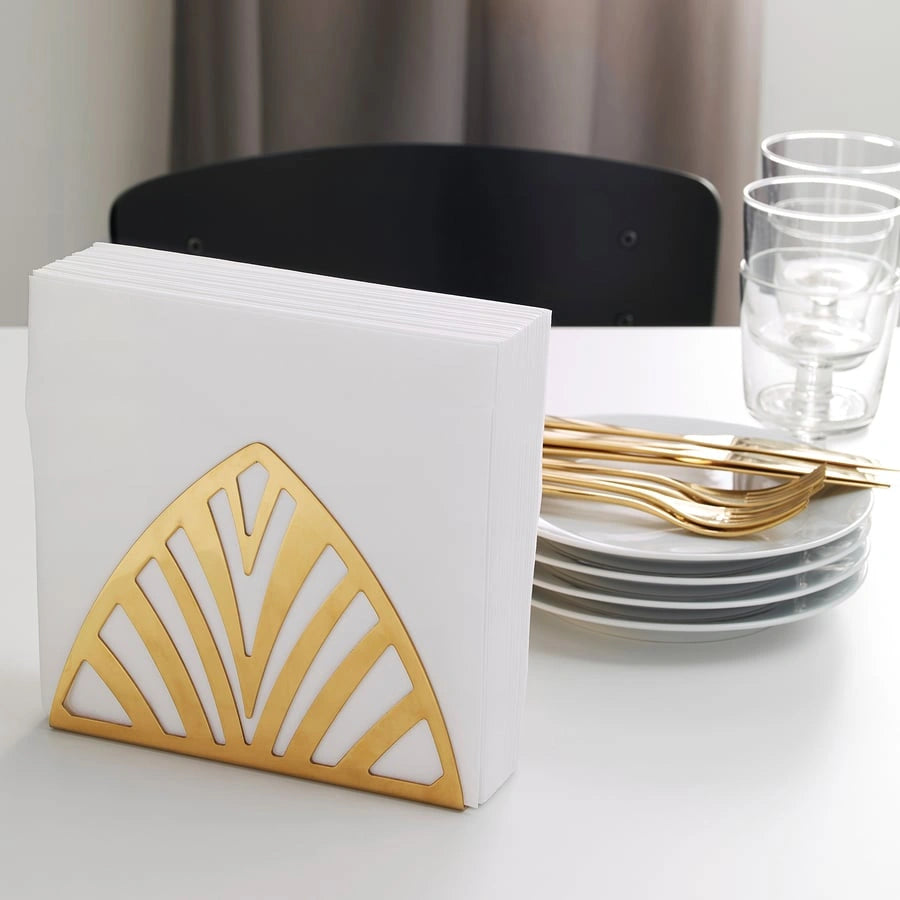 Side view of IKEA gold napkin holder