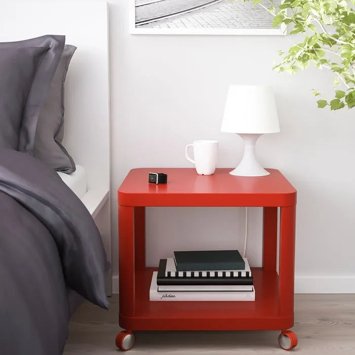 IKEA TINGBY side table on castors red 50x50 cm in living room.