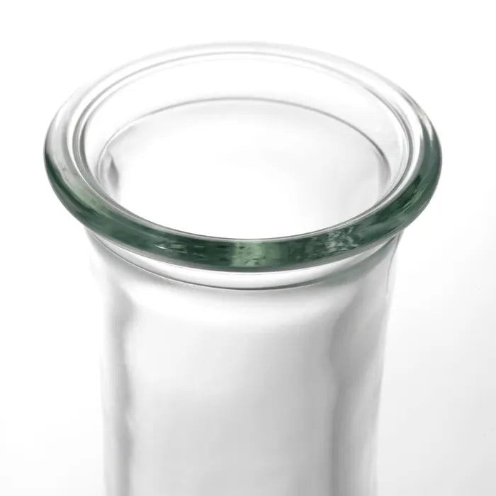Close-up of IKEA VILJESTARK clear glass vase.