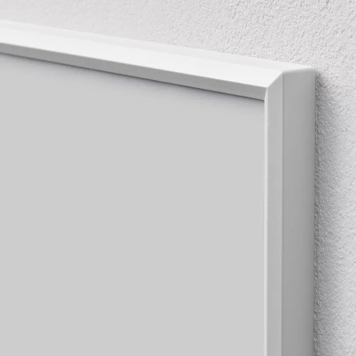 Close-up view of IKEA YLLEVAD white picture frame.