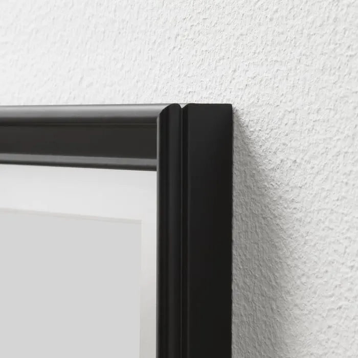 Close-up of IKEA KNOPPANG black photo frame