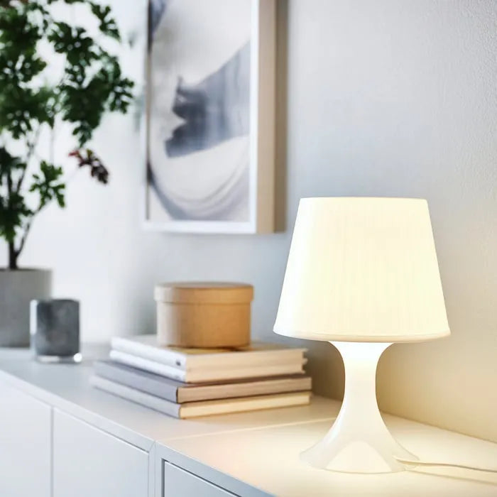 IKEA LAMPAN lamp placed in corner for cosy mood lighting
