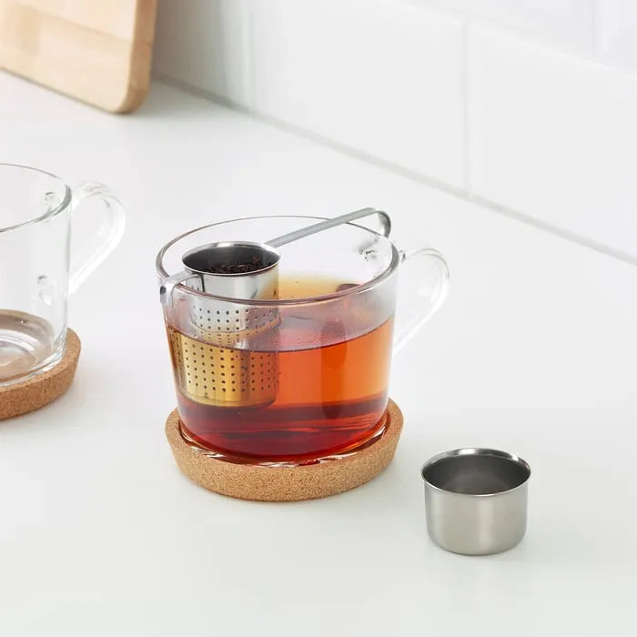 IKEA LJUDLÖS tea infuser placed in cup with loose tea