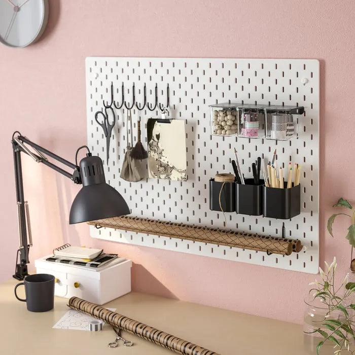 IKEA SKÅDIS hooks attached to pegboard for organisation
